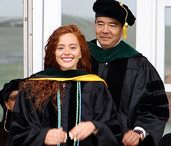 graduatewithherhooder