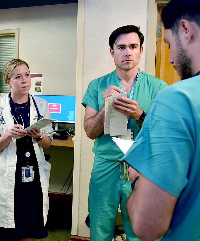 studentswritingnotesinhospitalhallway