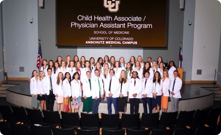 CUgraduatingclassofPAs2025posingtogetheronastage