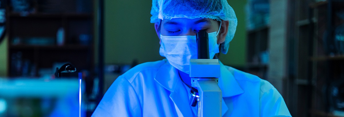 scientistatamicroscope