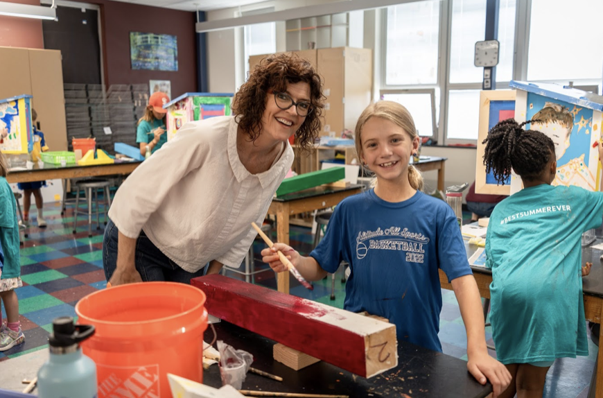 Dr. Neill Epperson with Child doing Art