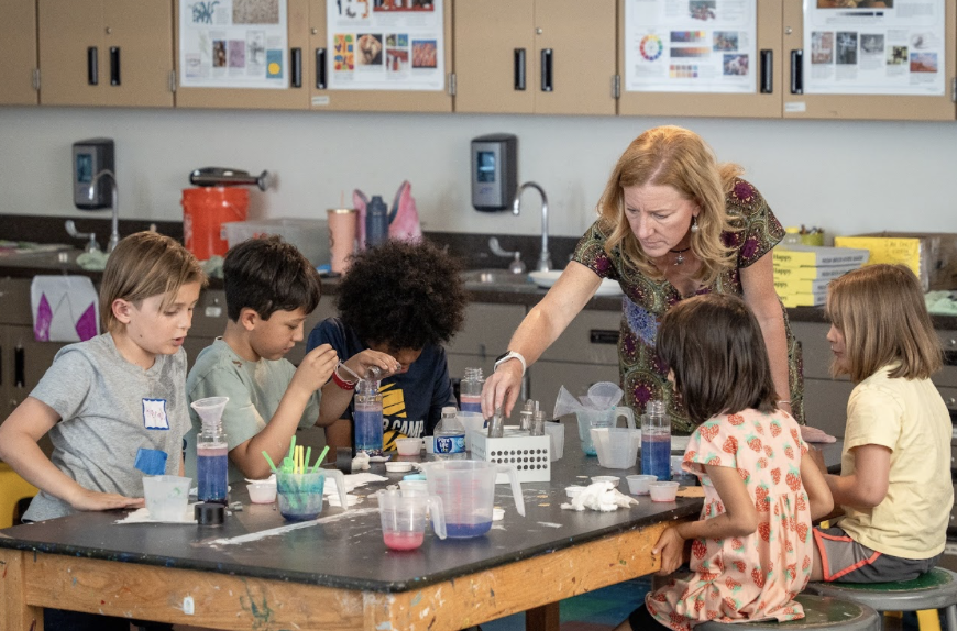 Tracy Bale with Children Learning Science