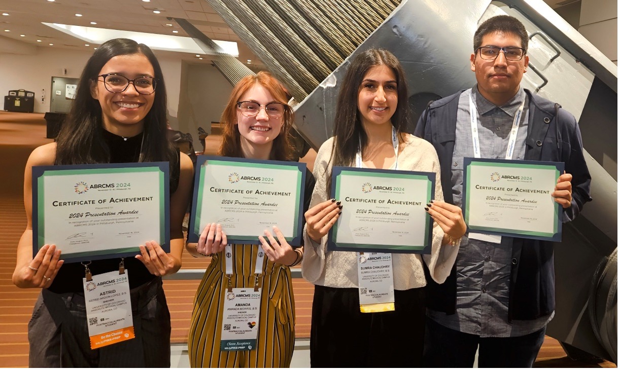 Group of students with their awards at 2024 ABRCMS