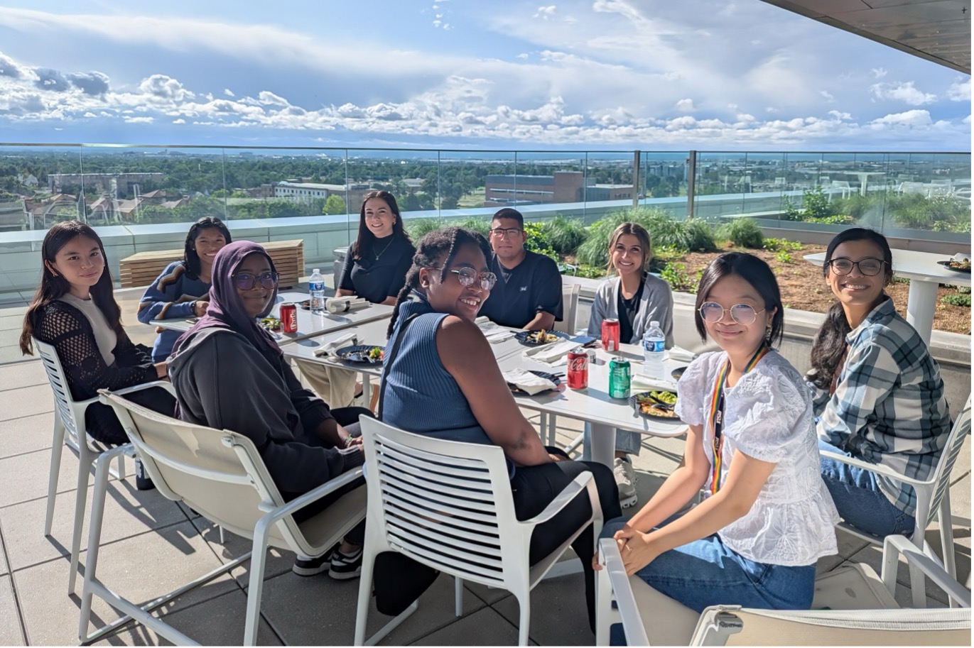 group of post grads on a balcony