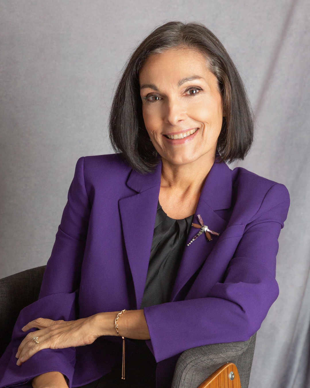 Woman in a purple blazer