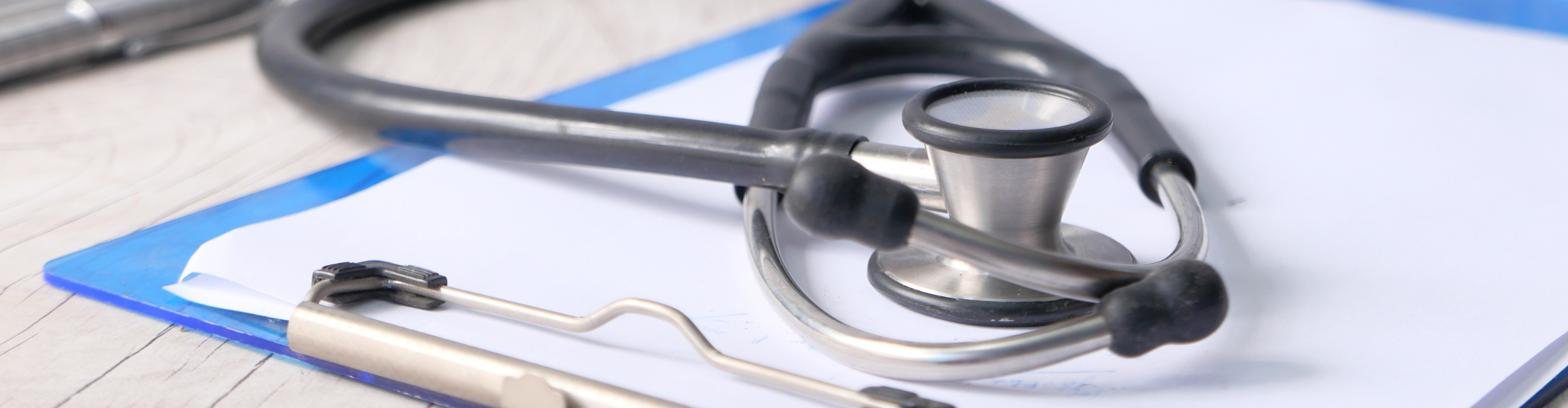 clipboard with a stethscope on top