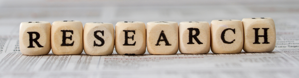 wooden blocks spelling out Research