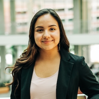 Headshot of a young brunette woman