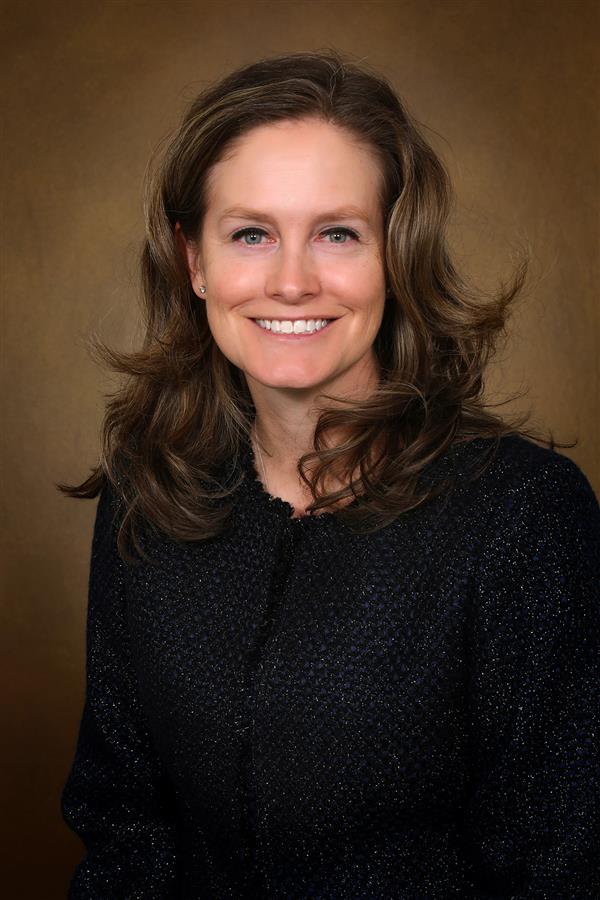 woman in black tweed jacket