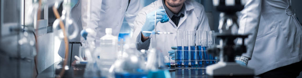 Scientists work together in a lab
