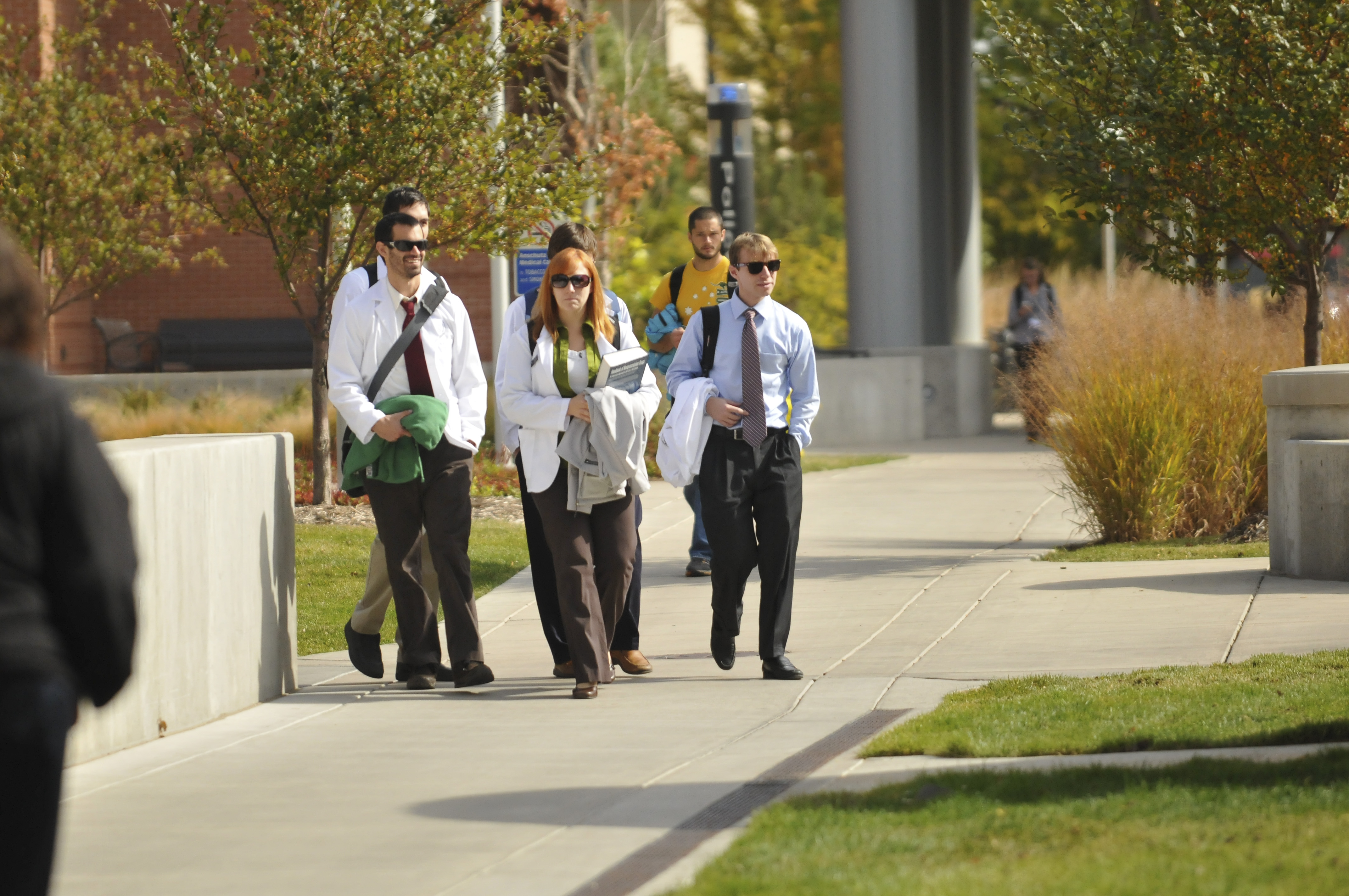 A group of medical students exiting a building