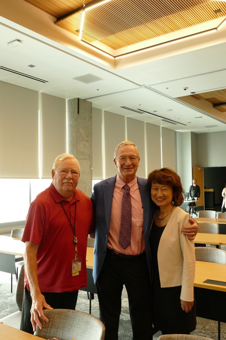Dennis Roop, David Norris, and Mayumi Fujita posing and smiling