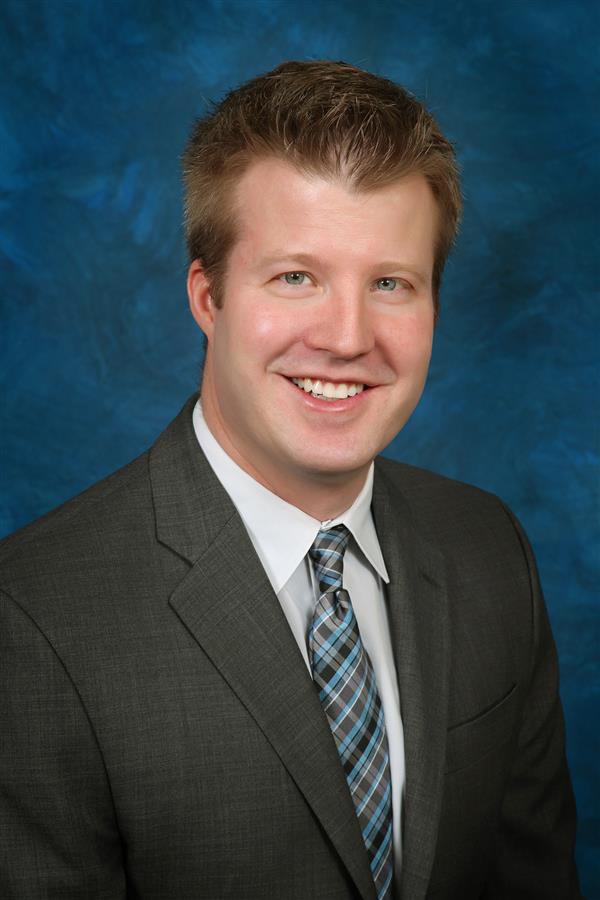 Professional headshot of Ryan Lanning, MD, smiling