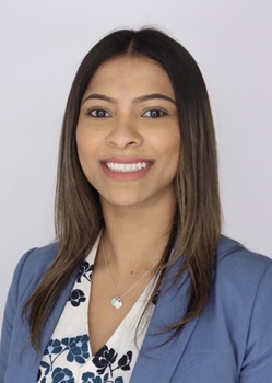 Professional photo of Neha Deo, MD, smiling and wearing a blue blazer