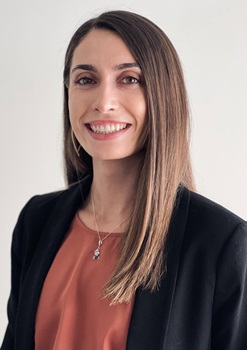 Professional photo of Caterina Prizio, MD, smiling and wearing a black blazer