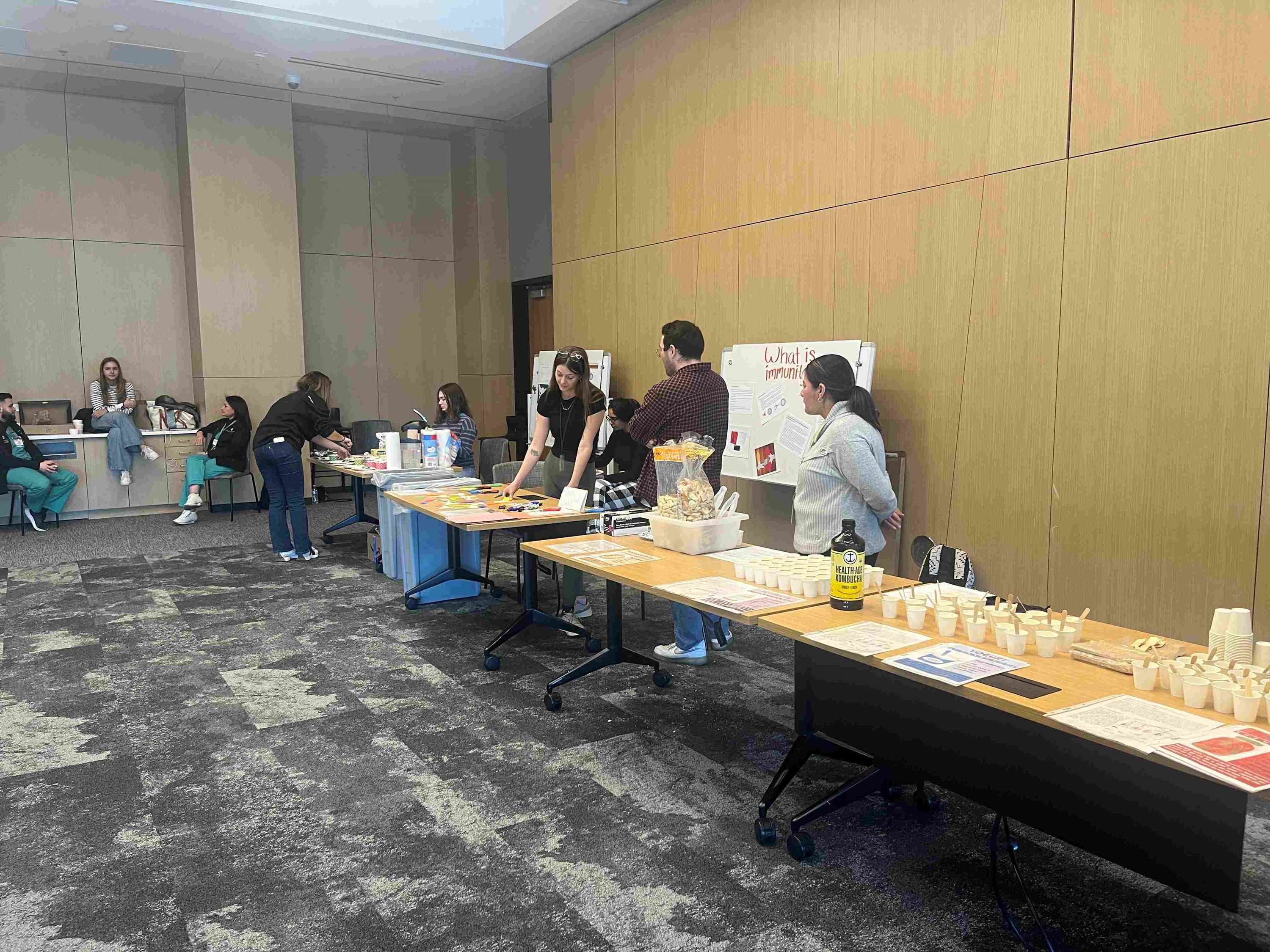 PhotooftablesandscienceacitiviessetupfortheYouthSummit