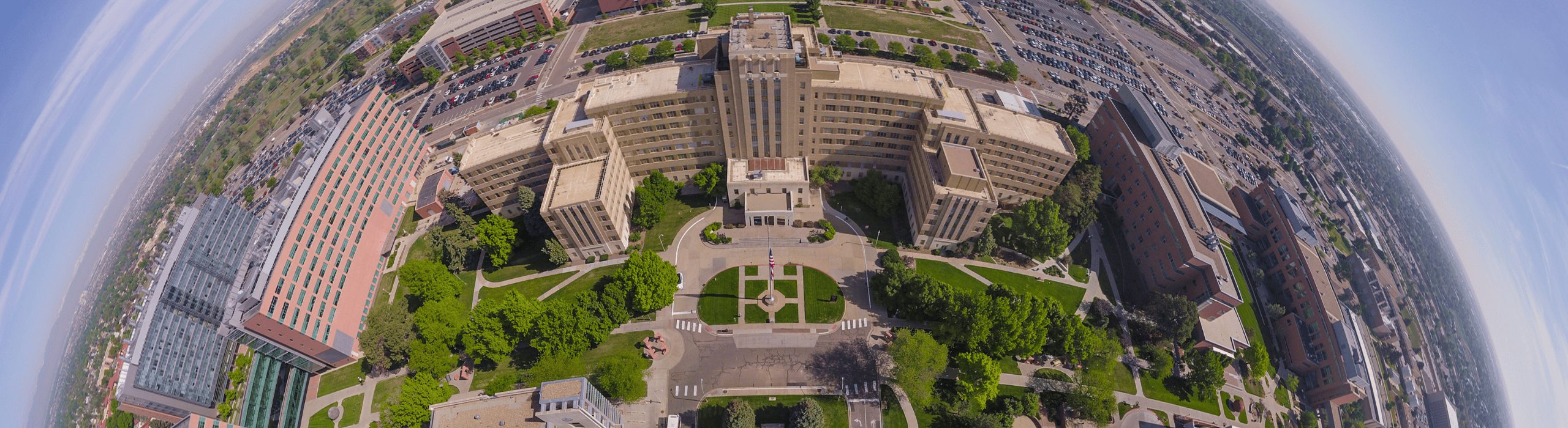 FisheyephotoofCUAnschutzcampuswiththeFitsimonsbuildinginthecenterMountainsareonthefarleftandtheplainonthfarright