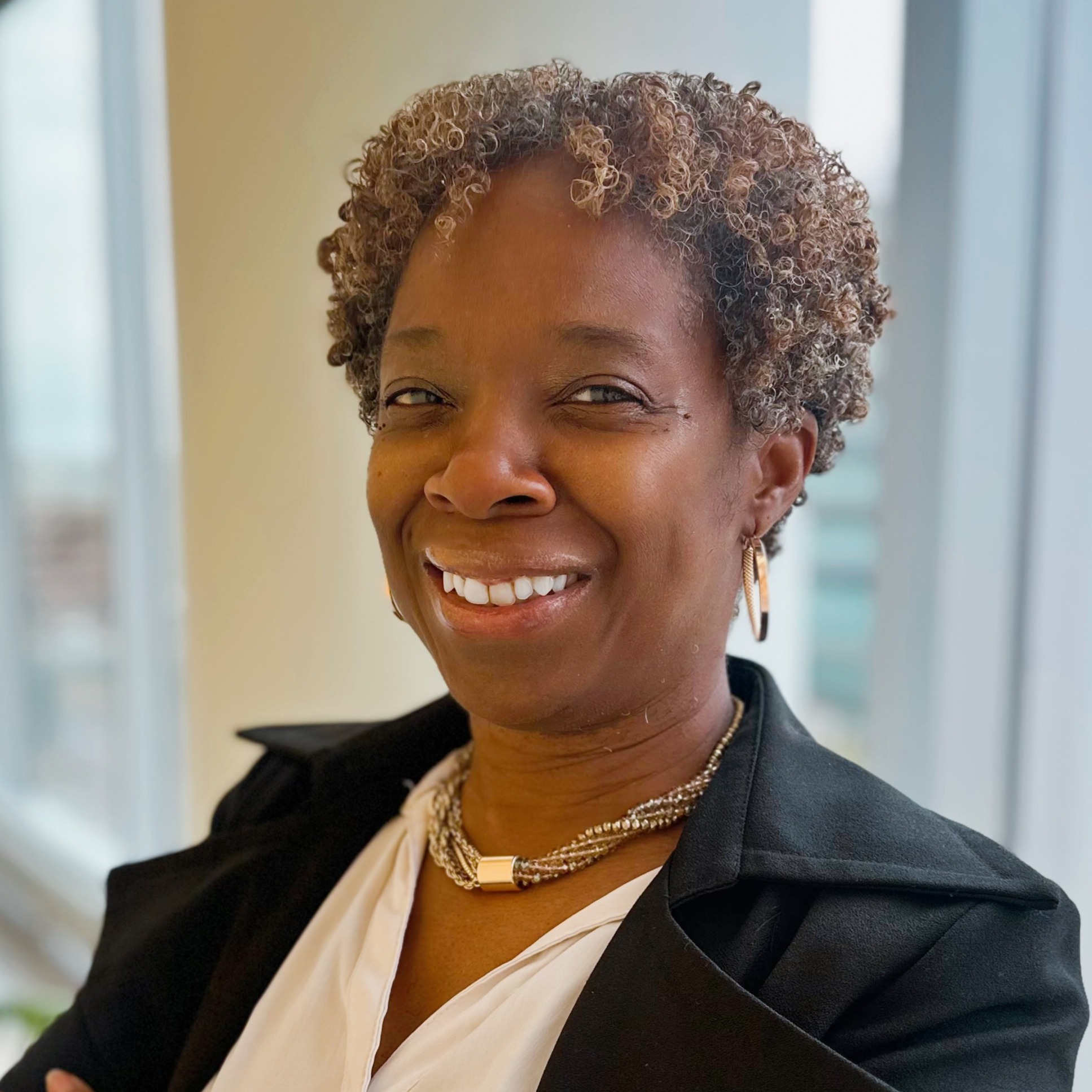 female smiling for a headshot