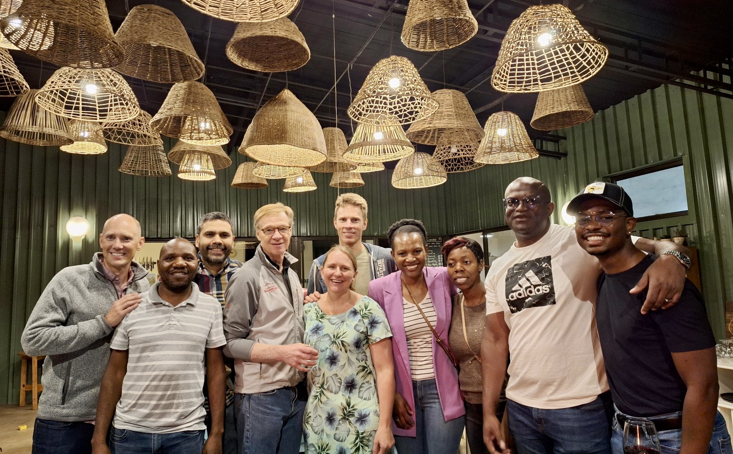 a group of people smiling for a photo
