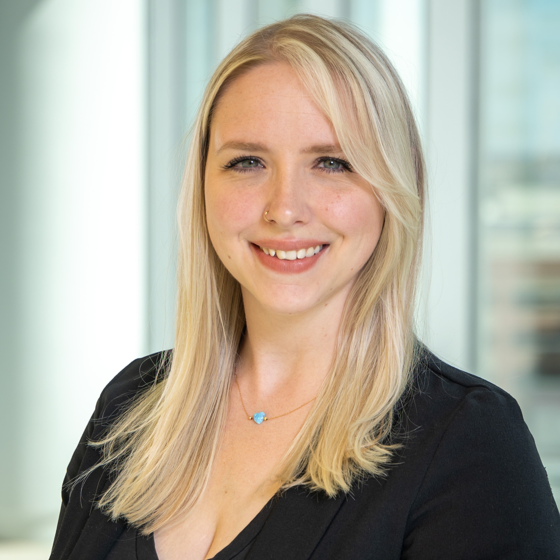 female smiling for a headshot