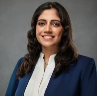 girl smiling in a suit