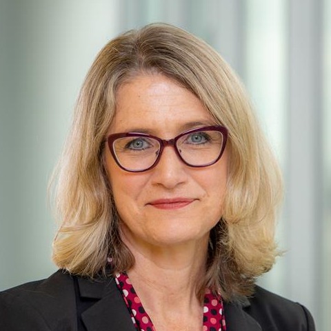 female smiling for a headshot