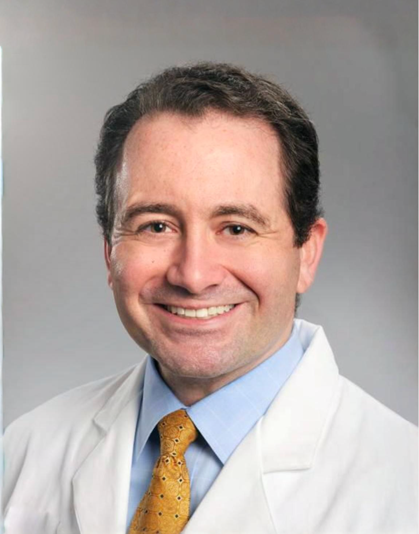 male doctor with white coat on