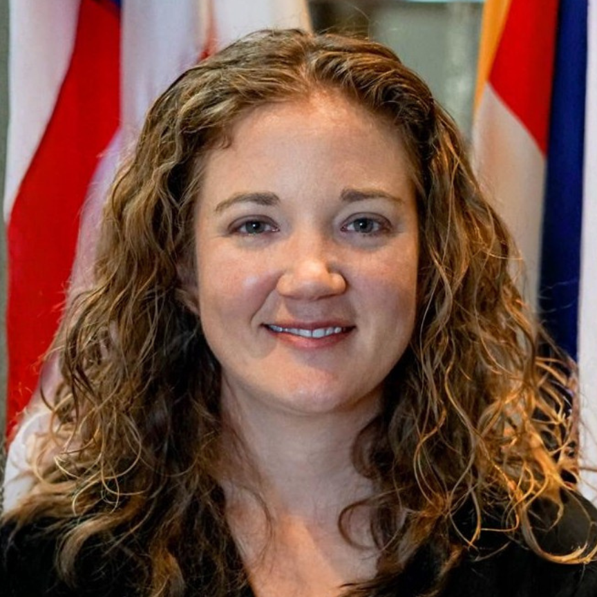 female smiling for a headshot