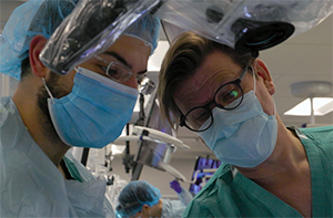 Surgeons in operating room, close-up