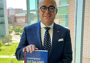 Dr. Youssef with his new book