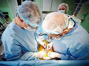 doctors operating on patient