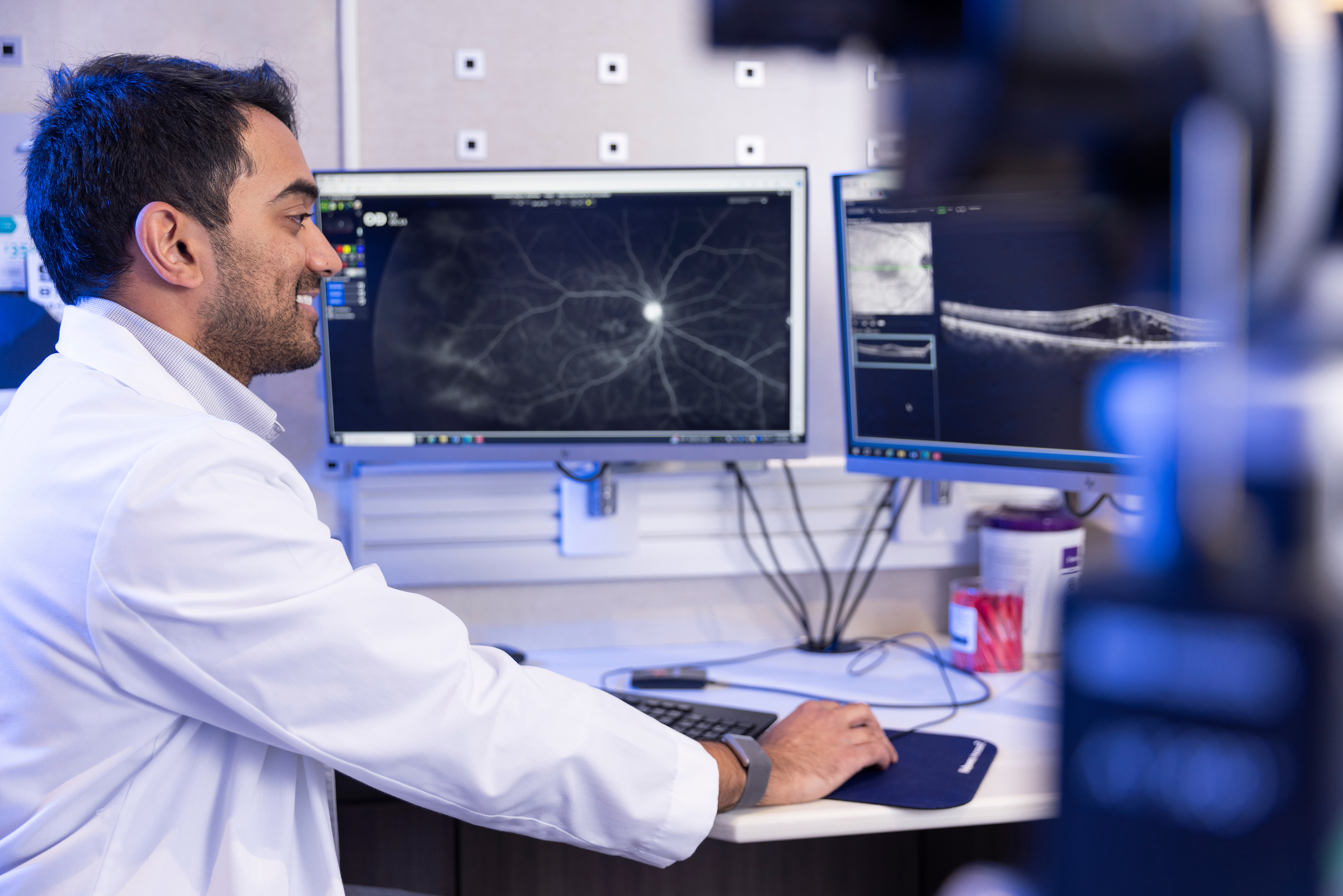 man looking at a computer