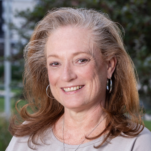 female smiling for a headshot