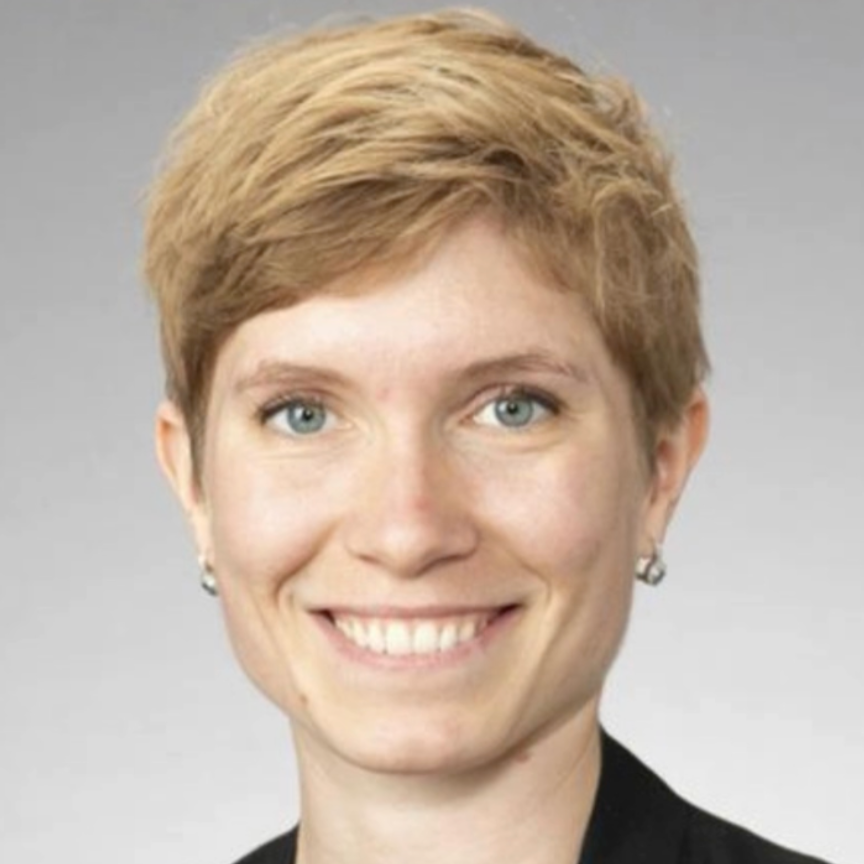 female doctor smiling for a headshot