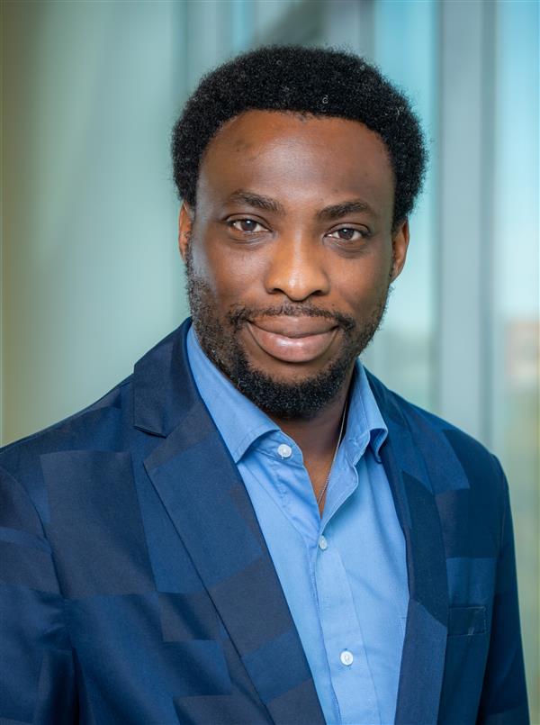 Dr. Alabi