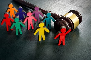 Advocacy graphic of gavel and wooden people
