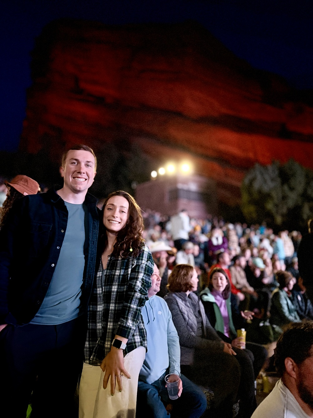 Dr. Callan with a person at a concert at Red Rocks.