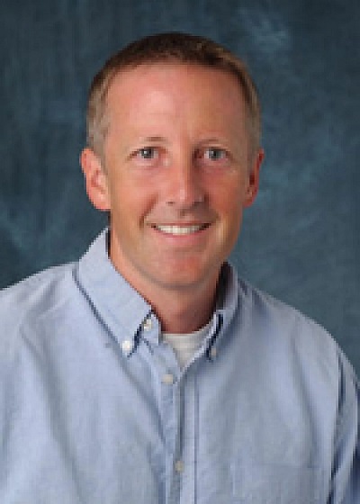 Headshot of Dr. Christopher Lowry