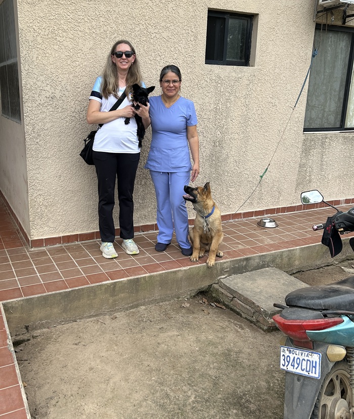 Amanda Miller with a practitioner outside the clinic.