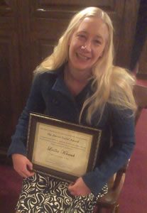 Leslie Knaub receiving the Steven Fadul Award