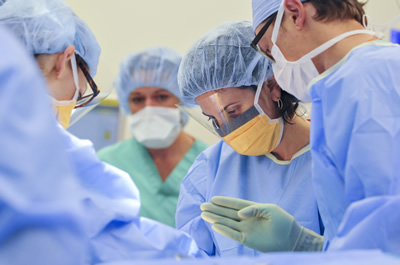 Dr. Kounalakis and other surgeons in the operating room