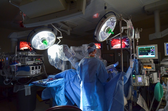 Two surgeons operating in OR