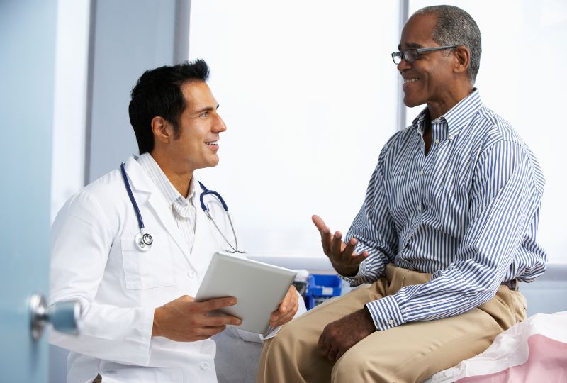 A doctor speaking with their patient.