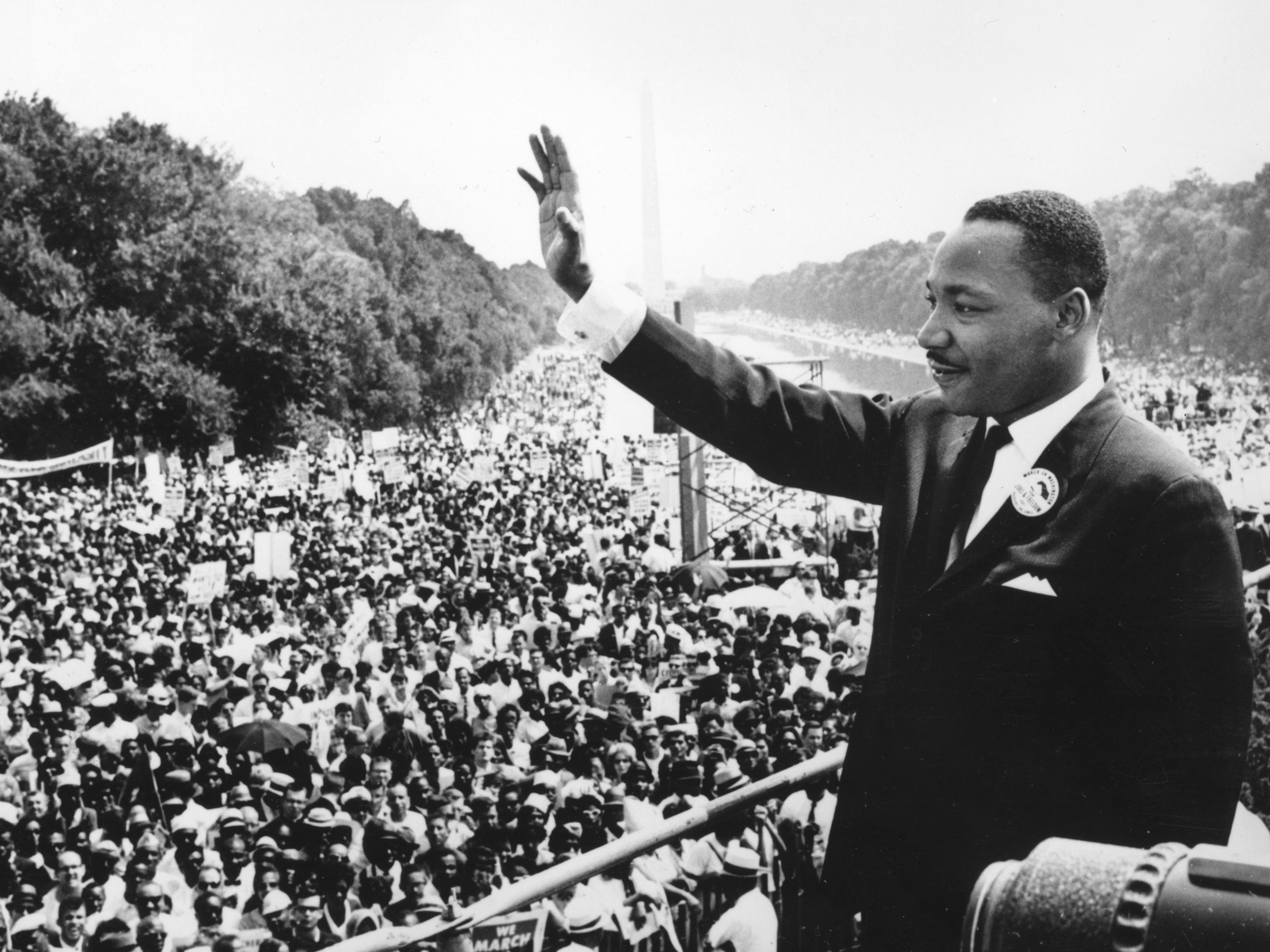 Black and white photo of Martin Luther King Jr. giving a speech
