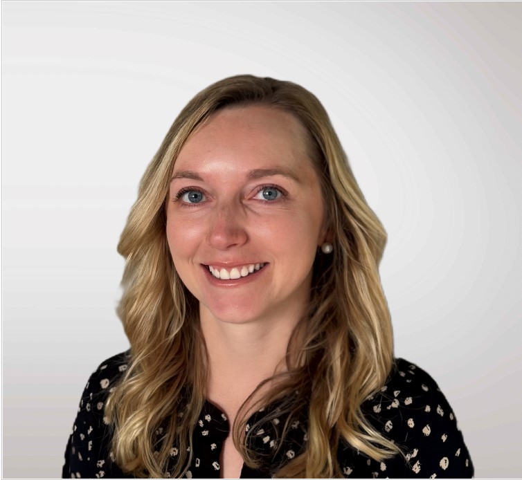 Headshot of woman with blank background.