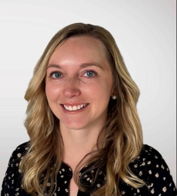 Headshot of woman with blank background.