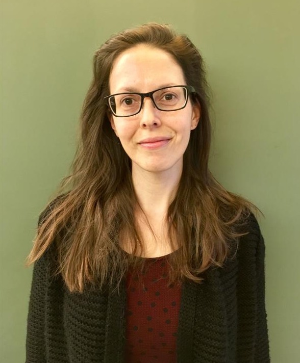 professional headshot of woman in sweater