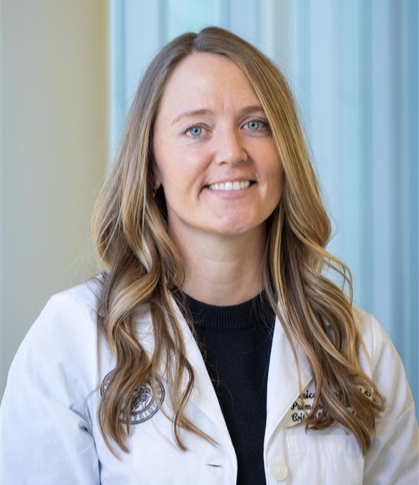 professional headshot of woman in lab coat