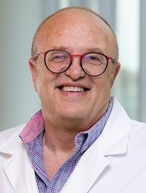 Headshot of a man in lab coat