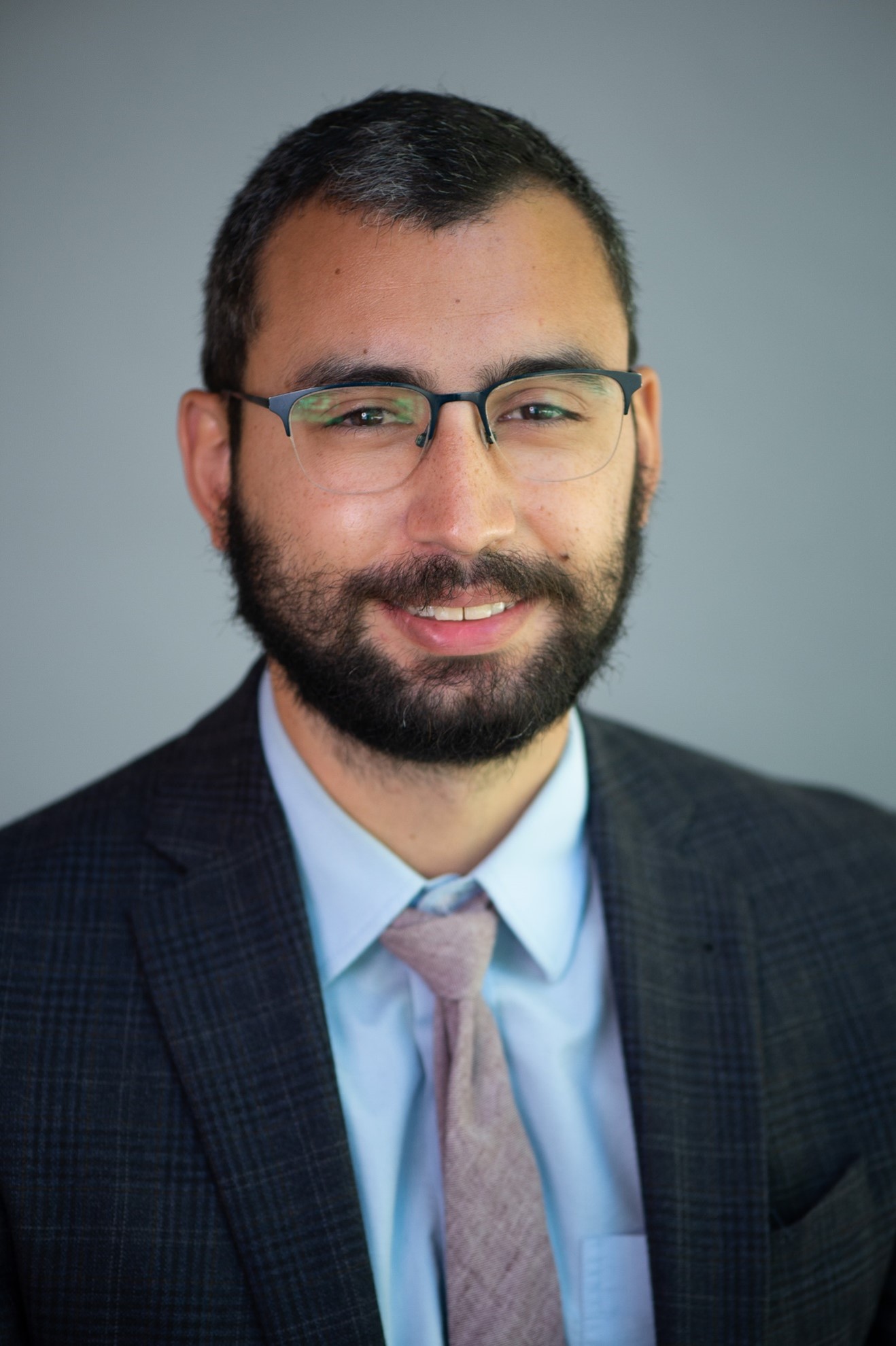 headshot of man in suit